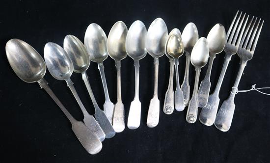 Twelve assorted silver spoons including 19th century, two similar forks and a plated tablespoon. 17 oz.